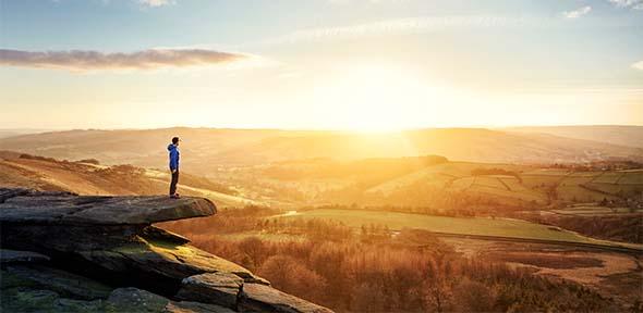Person looking at sunrise
