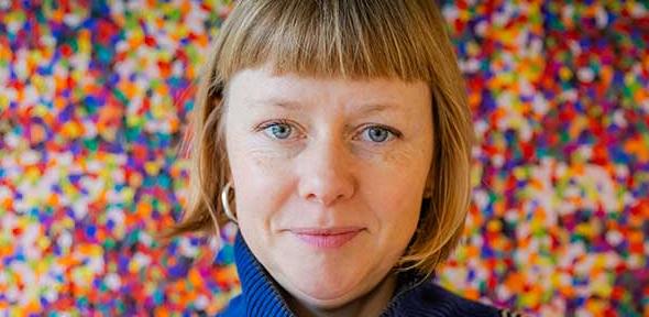 Harriet Loffler in front of painting 