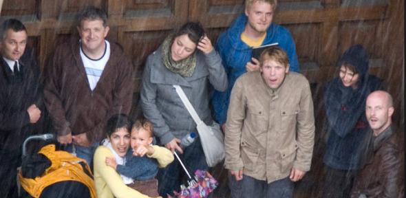 Tourists hiding from the rain.