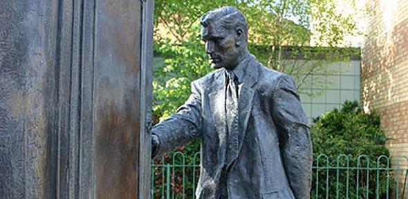 The Searcher, a statue of CS Lewis by sculptor, Ross Wilson, at Holywood Arches Library in Belfast