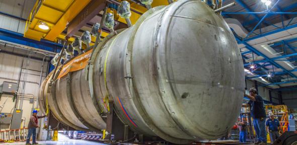 Teams prepare to move the MicroBooNE cryostat from DZero to the Liquid Argon Test Facility (LArTF).