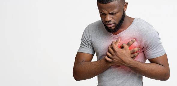 Man experiencing heartburn