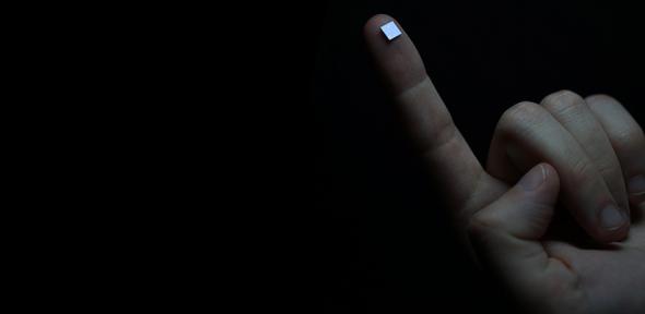 On-chip spectrometer on a fingertip