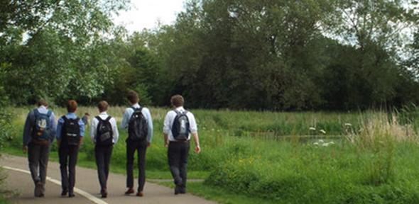 Five lads walk home from school through Myton Fields, Warwick