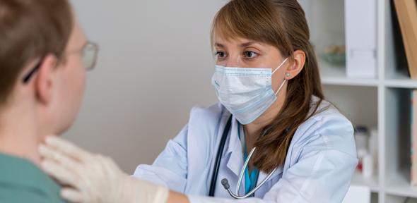 Doctor examining a patient