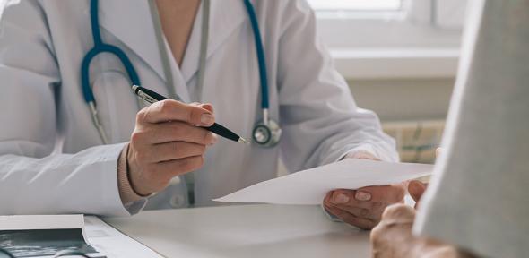 Doctor consulting with patient