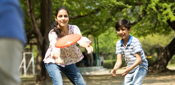 Family playing frisbee