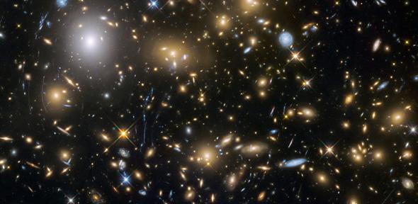 Observations by the NASA/ESA Hubble Space Telescope have taken advantage of gravitational lensing to reveal the largest sample of the faintest and earliest known galaxies in the universe. 