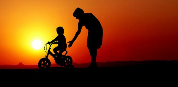 Mother and child at sunset