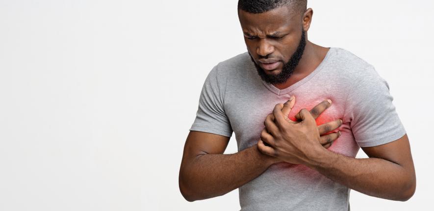 Man experiencing heartburn