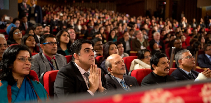 Audience members listen to the President Obama's speech on India and America at the Siri Fort Auditorium