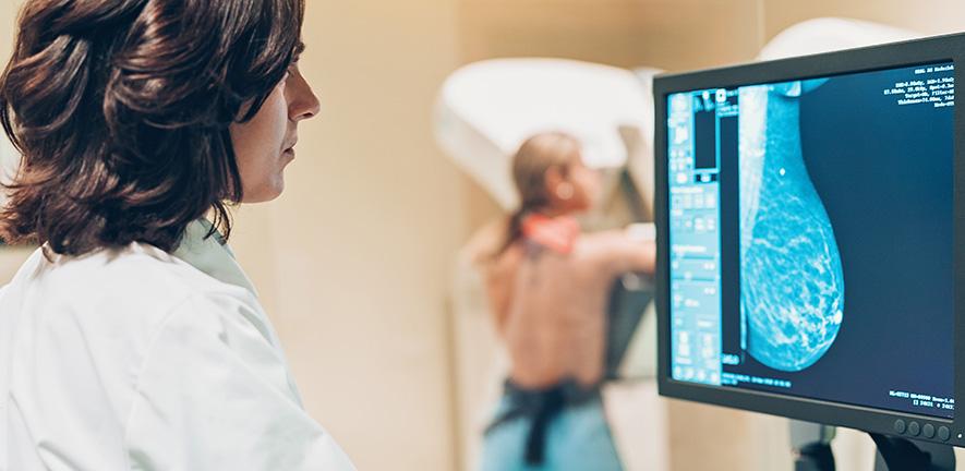 Doctor and patient making a mammography