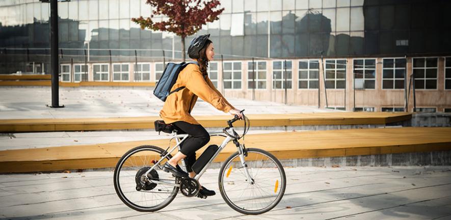 Businesswoman on electric bike