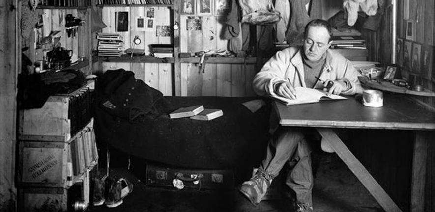 Scott writing in his hut during the fateful Terra Nova expedition.