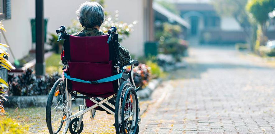 Woman sitting in a wheelchair