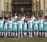 Cambridge football men's and women's team combined stand together