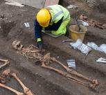 Archaeologists excavating a medieval friary in Cambridge