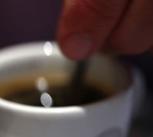 Dunking a cookie into a cup of coffee