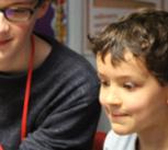 STIMULUS mentor, Alexander Simpson, with pupils at St Luke's Primary School, Cambridge.
