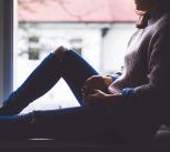 Woman at home alone