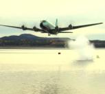 A DC4 drops a bouncing bomb in the reconstructed Dambusters operation.