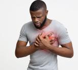Man experiencing heartburn