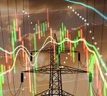 High voltage electricity towers combined with economic charts