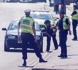 Police stopping traffic in UK lockdown