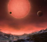 Artist’s impression of the ultracool dwarf star TRAPPIST-1 from the surface of one of its planets. 