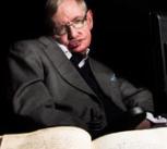 Priceless treasures: in a shot commissioned to celebrate Cambridge University Library’s 600th anniversary, Professor Stephen Hawking is pictured with Newton’s annotated first edition of Principia Mathematica.