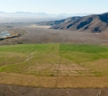 Vast pivot irrigator shows farming encroaching on wilderness in New Zealand.  
