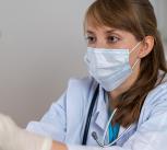 Doctor examining a patient
