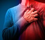 Person clutching their chest in pain