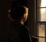  A girl looking out of a window
