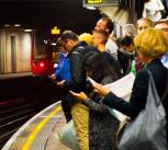 Passengers at a London Underground station
