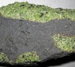 Chunks of exotic green rocks from the mantle erupted from the San Carlos Volcanic Field, Arizona