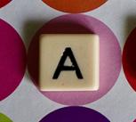 Tiles spelling "autism"