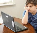 Boy taking part in a virtual lesson