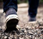 Feet walking on gravel