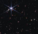 This image shows the galaxy EGSY8p7, a bright galaxy in the early Universe where light emission is seen from, among other things, excited hydrogen atoms – Lyman-α emission. 
