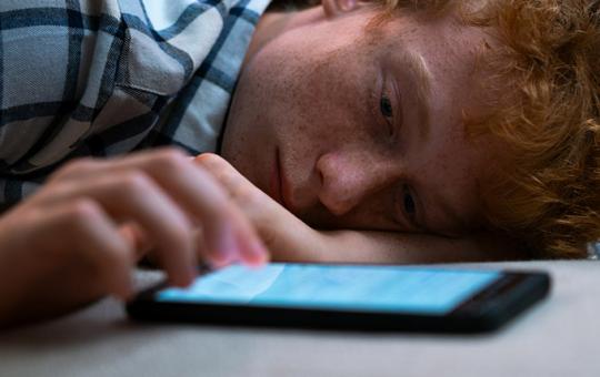 Teenage boy with smart phone 