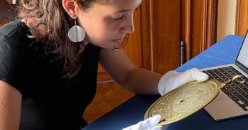 Dr Federica Gigante examining the Verona astrolabe