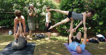 People doing yoga together outdoors in Richmond USA in 2015