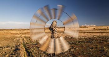 Drone shot in front of a spinning weather station, Free State, South Africa 