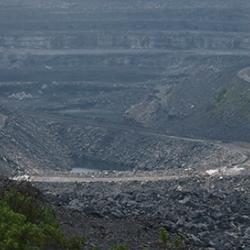 Coal mine in Dhanbad, India. The biodiversity loss caused by the Indian mining industry has been widely criticised and is an example of the type of issue around which scientists now claim religious leaders could mobilise public action.