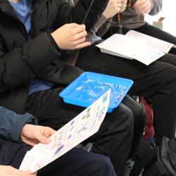 Students make antibody keychains during a workshop with the MRC Toxicology Unit
