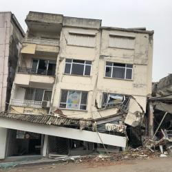 A partially-collapsed building in the aftermath of the Turkey-Syria earthquakes in 2023.