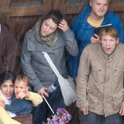 Tourists hiding from the rain.