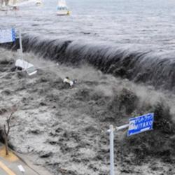 A wave approaches Miyako City from the Heigawa estuary in Iwate Prefecture