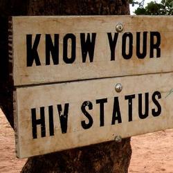 Know your HIV status sign in Simonga village, Zambia.